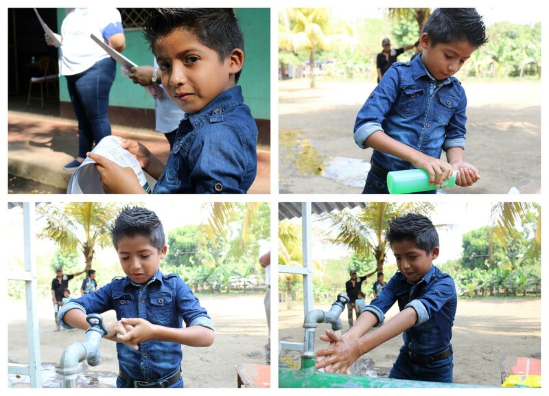 Young boy washing his hands